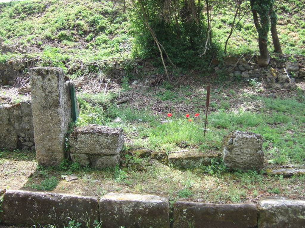 III.10.5 Pompeii. May 2006.  Remains of front wall on east side of entrance.