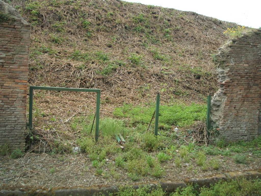 III.11.5 Pompeii.  May 2005.  Entrance to caupona, and steps to upper floor. 

It is difficult to reconcile the entrances in this insula with the plans as the entrances onto Via Nola have been filled in or are unexcavated.
