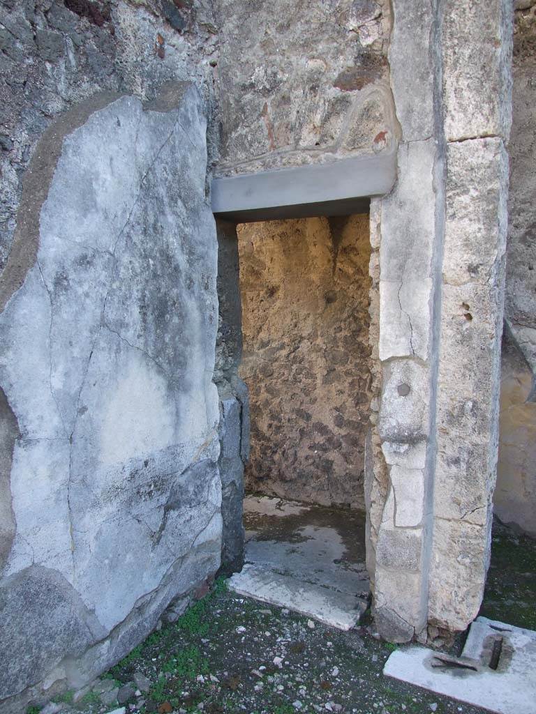 V.1.7 Pompeii. December 2007. Room 13, doorway in south-east corner of atrium.