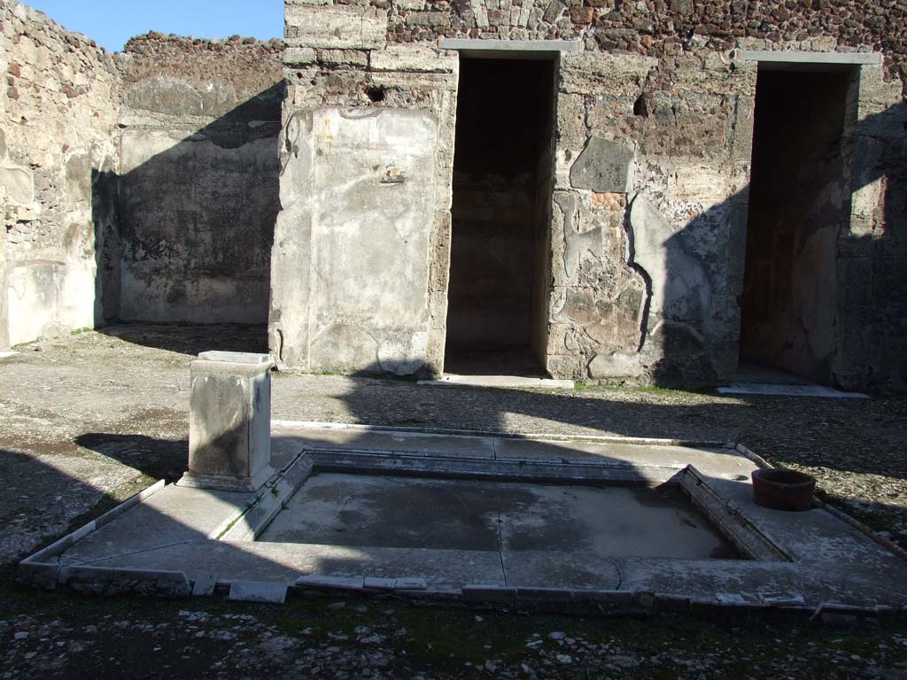 V.1.7 Pompeii. December 2007. Looking east across atrium 4 towards doorways to rooms 9,8 and 7. 