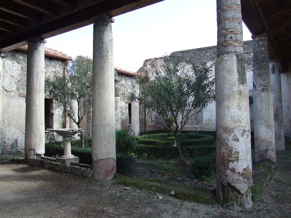 V.1.26 Pompeii. March 2009. Room L, looking south-east across peristyle garden, from north portico.