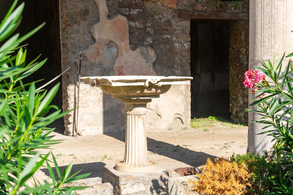 V.1.26 Pompeii. October 2023. Room L, marble basin on north portico of peristyle. Photo courtesy of Johannes Eber.