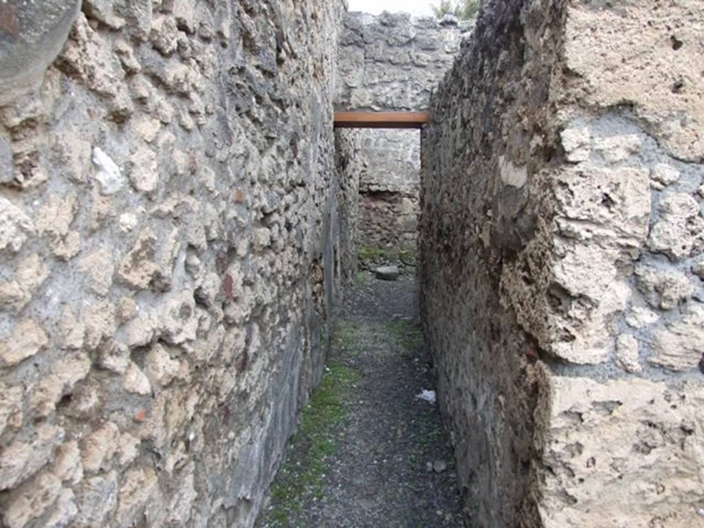 V.2.13 Pompeii,  March 2009.  Corridor to rear.