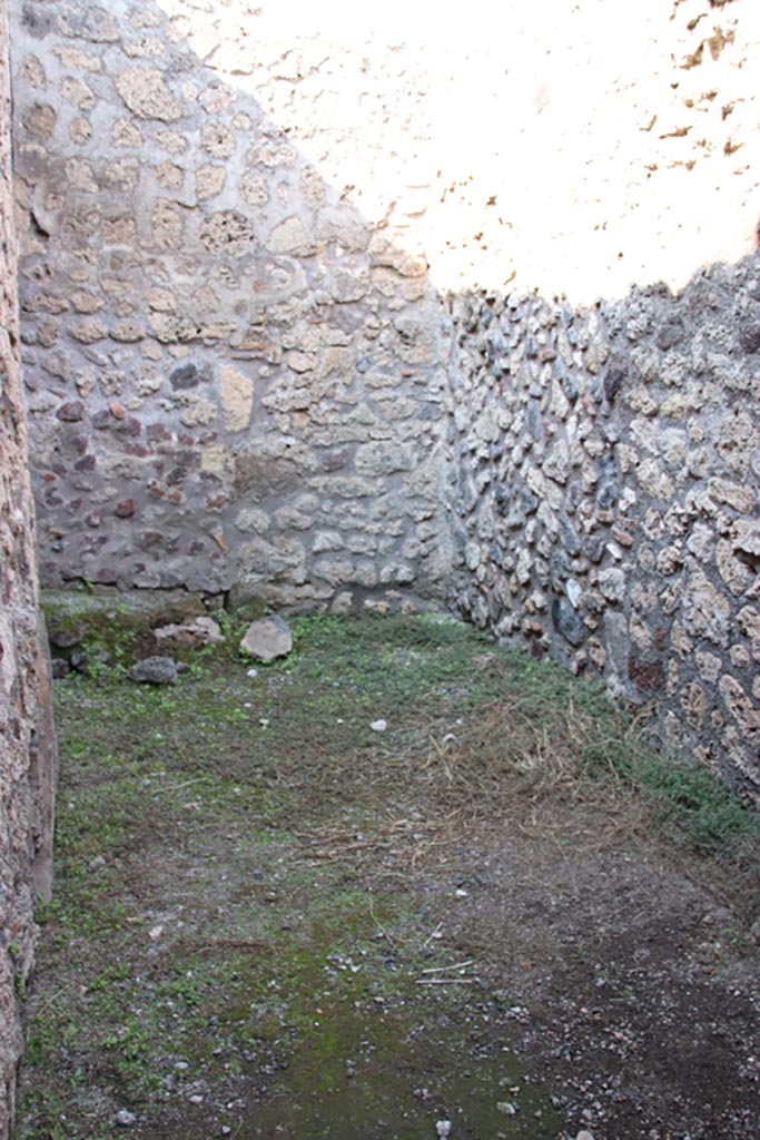 V.2.13 Pompeii. October 2022. 
Looking north in rear kitchen with latrine. Photo courtesy of Klaus Heese.
