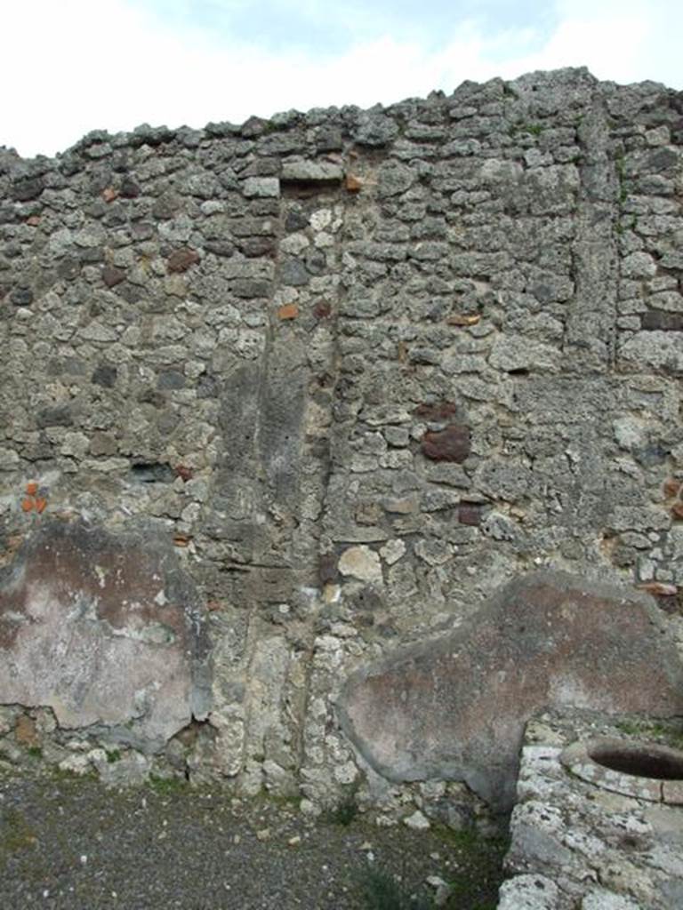 V.2.13 Pompeii. September 2015. West wall, with masonry hearth or base, and corridor to rear.