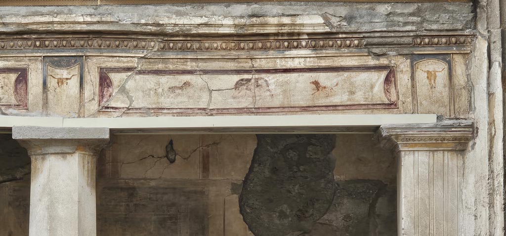 V.2.i Pompeii. December 2007. Room 23, details of painted lintels in Rhodian peristyle.  
