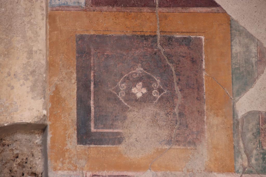 V.2.i Pompeii.  October 2023. Room 1, detail from upper north wall in atrium. Photo courtesy of Klaus Heese.