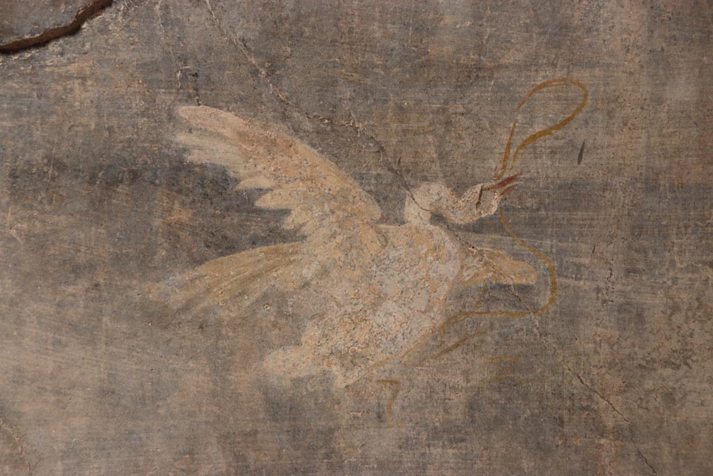 V.2.i Pompeii.  October 2023. Room 1, north wall, detail of painted swan in middle panel. Photo courtesy of Klaus Heese.
