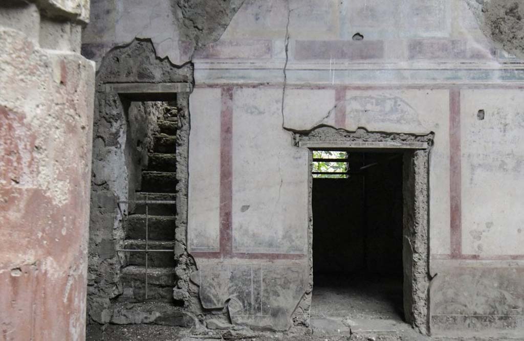 V.2.i Pompeii. May 2018. Room 1, atrium. East side showing staircase and doorway to room 4.