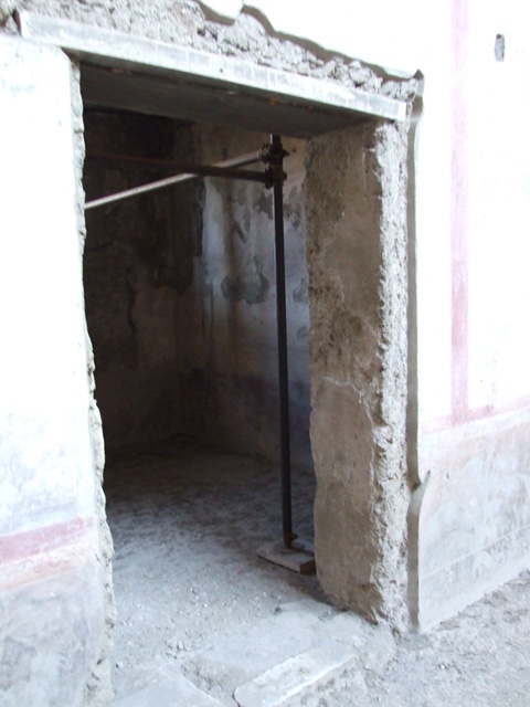 V.2.i Pompeii. March 2009.  Doorway to Room 2b, on west side of atrium.