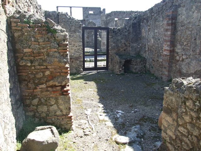 V.3.6 Pompeii. March 2009.  Looking south from end of Corridor, into Shop room.