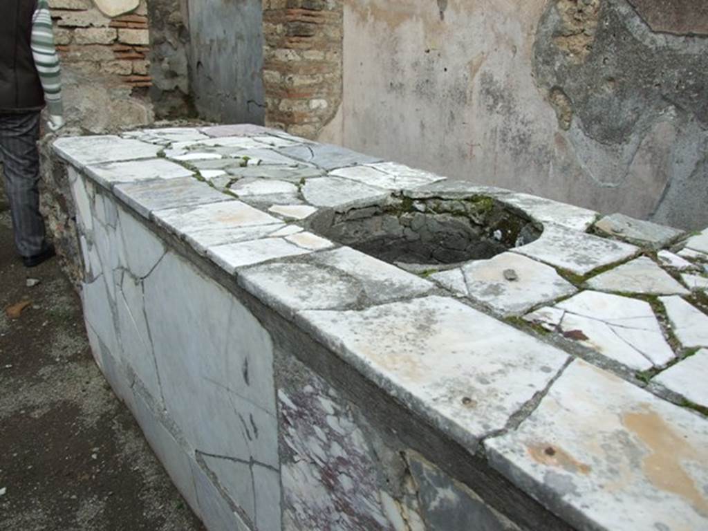 V.4.7 Pompeii. May 2017. Arched recess beneath stone bench or hearth. Photo courtesy of Buzz Ferebee.

