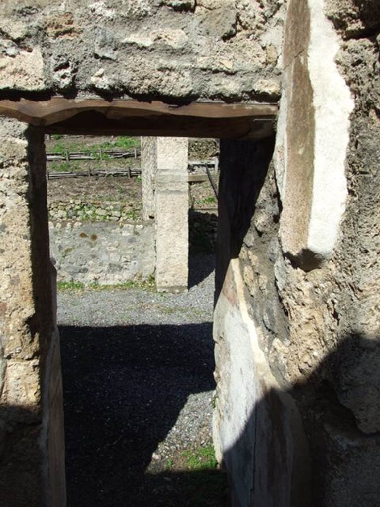 V.5.3 Pompeii. March 2009. Room 12, north-east corner with doorway to large triclinium.