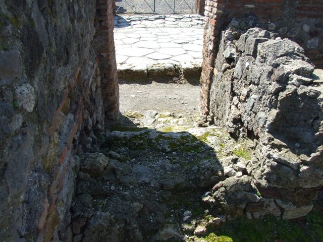 VI.1.3 Pompeii.  March 2009.  Steps to upper floor looking west.