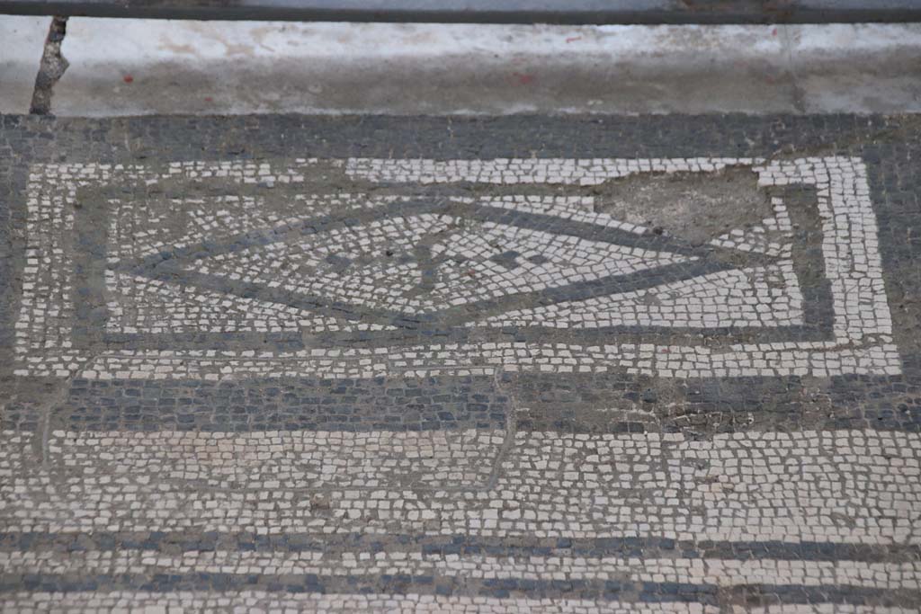 VI.1.8 Pompeii. September 2021. 
Detail of mosaic threshold of doorway leading to atrium of VI.1.7, on east side. Photo courtesy of Klaus Heese.
