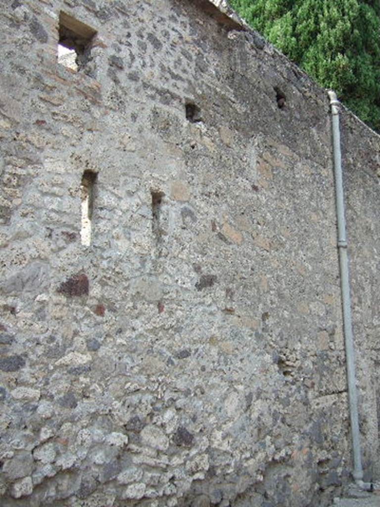 Wall of VI.1.23 on Vico di Narciso

