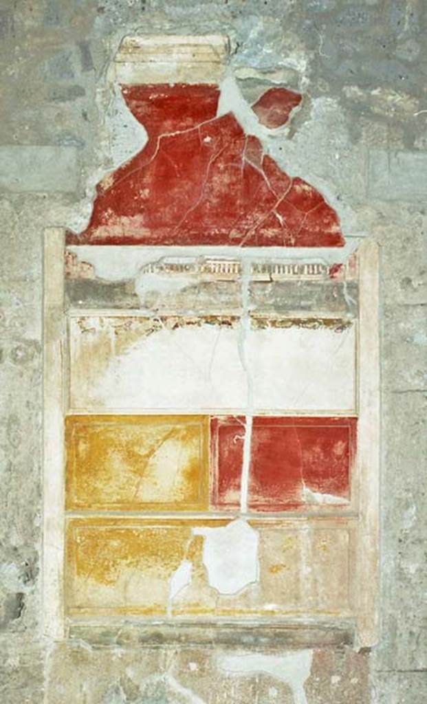 VI.2.4 Pompeii. October 2001. Detail of wall decoration on north side of atrium, between doorways to the anteroom of the winter triclinium, and a cubiculum.  Photo courtesy of Peter Woods.
