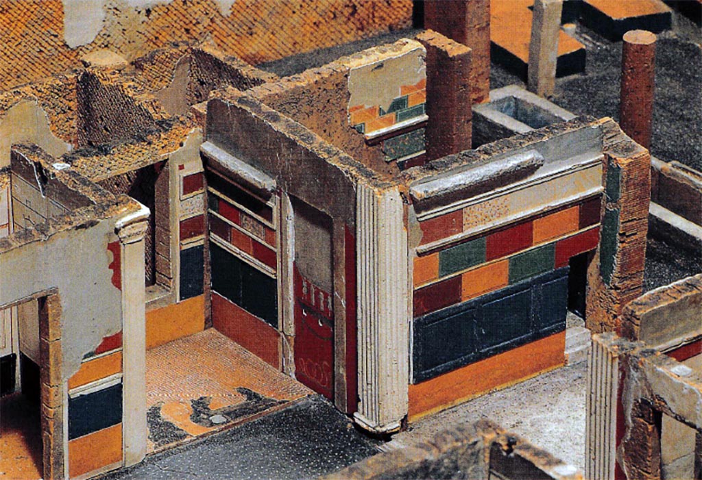 VI.2.4 Pompeii. 1840. Looking north-east across atrium towards the north ala, lararium and tablinum as shown on model.
Model of the Casa di Sallustio, by A. Padiglione und G. Abbate, 1840 (Aschaffenburg Cat. 53).
See Kockel V., 1993. Das Haus des Sallust in Pompeji: Eine dreidimensionale archäologische Dokumentation aus dem 19. Jahrhundert. P. 345, AbbFarb 22.
According to Fröhlich, the red-ground painted wall surface is in a niche created by the obstruction of a door blocked in the 1st century BC., as there is Second Style decoration on its back in the room behind. In the middle of the upper pictorial zone, the sacrificing genius without a cornucopia is standing at a portable altar and opposite him is the tibicen, who has one foot on a scabellum [stool]. The scene is flanked by the two Lares. A garland can be seen at the top of the picture, the ends of which hang down at the sides. A similar garland was painted in the top of the lower zone of the picture, under which was depicted a snake crawling to the right. 
See Fröhlich, T., 1991. Lararien und Fassadenbilder in den Vesuvstädten. Mainz: von Zabern, L57, p. 274, Abb. 3.