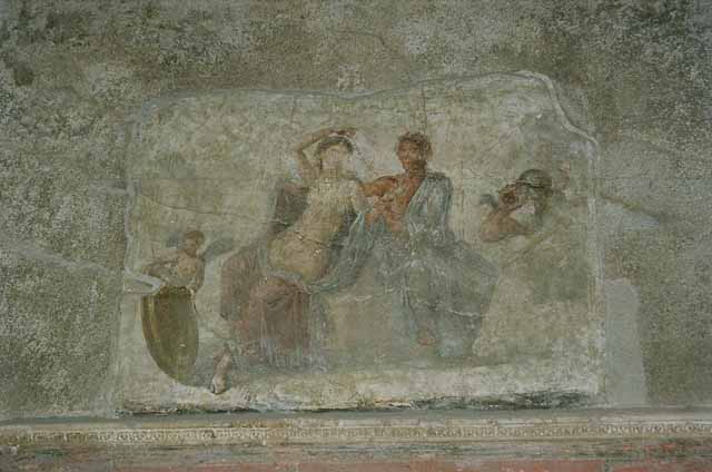 VI.2.4 Pompeii. May 2006. Cubiculum in the south-west corner of small garden. Wall painting of Ares and Aphrodite. Mau states: On the outer walls of the 2 sleeping rooms, in the south Garden, ………room on the right on the rear inner wall - two pairs of lovers, Paris and Helen in the House of Menelaus, and Aries and Aphrodite. See Mau, A., 1907, translated by Kelsey F. W. Pompeii: Its Life and Art. New York: Macmillan. (p.283-7). Helbig states: 2nd peristyle on the south side of the house, room to the right behind this peristyle, Paris & Elena, 1311, above that – Aphrodite and Aries 319.  See Helbig, W., 1868. Wandgemälde der vom Vesuv verschütteten Städte Campaniens. Leipzig: Breitkopf und Härtel. (1311, 319).
