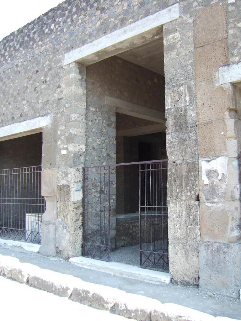 VI.2.4 Pompeii. April 2019. Looking east on Via Consolare towards entrance doorway.
Photo courtesy of Rick Bauer.

