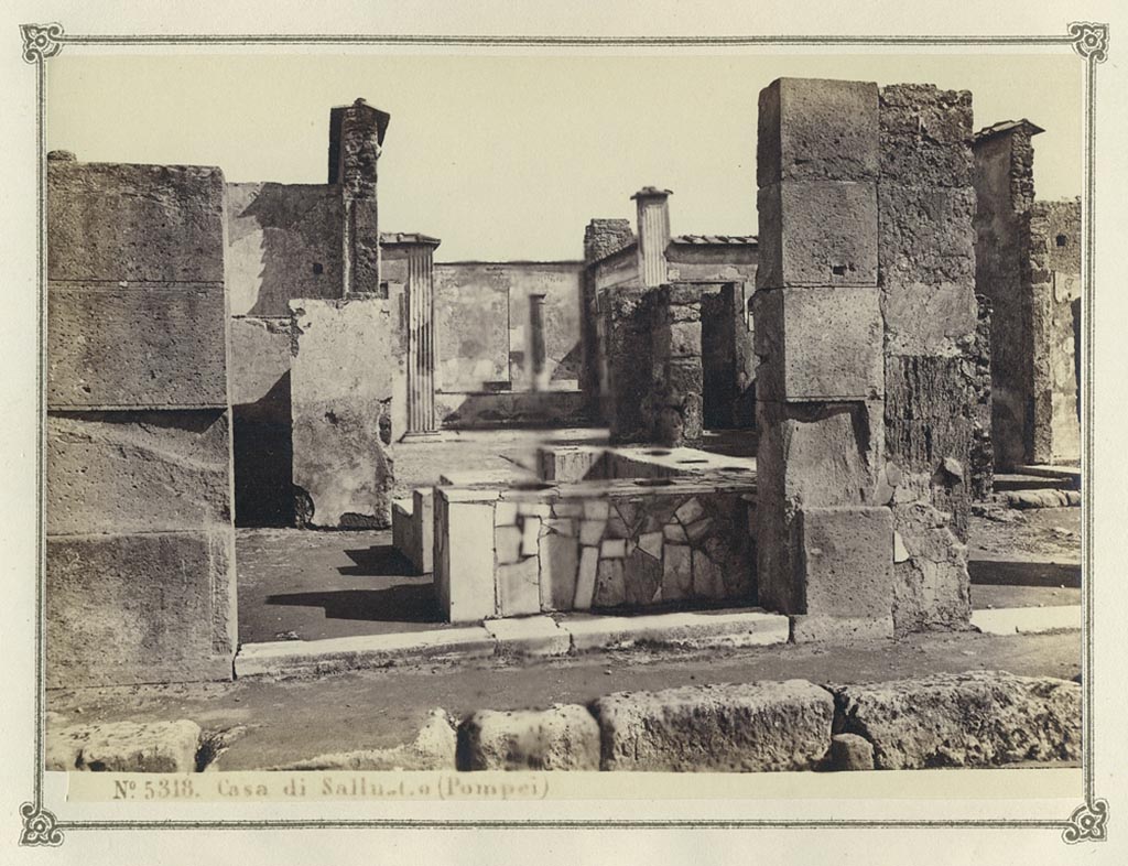 VI.2.5 Pompeii, on left. The entrance doorway to VI.2.4 is on the right.
From an album of Michele Amodio dated 1874, entitled “Pompei, destroyed on 23 November 79, discovered in 1745”. 
Looking east from Via Consolare. 
Photo courtesy of Rick Bauer.

