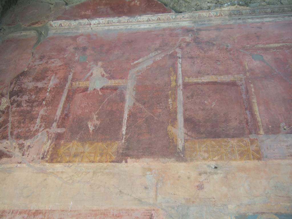 VI.2.14 Pompeii. September 2005. Triclinium painted upper west wall, south end of blue central panel. 