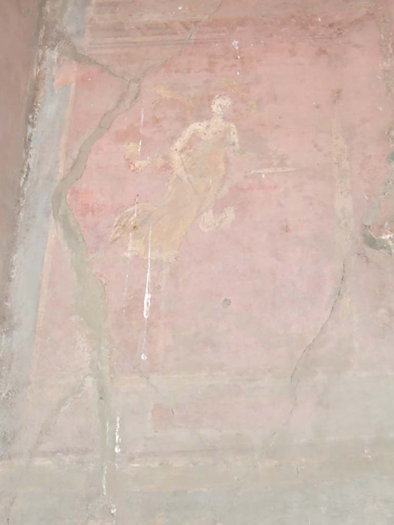 VI.2.14 Pompeii. September 2005. Painted figure on upper north wall at west end.