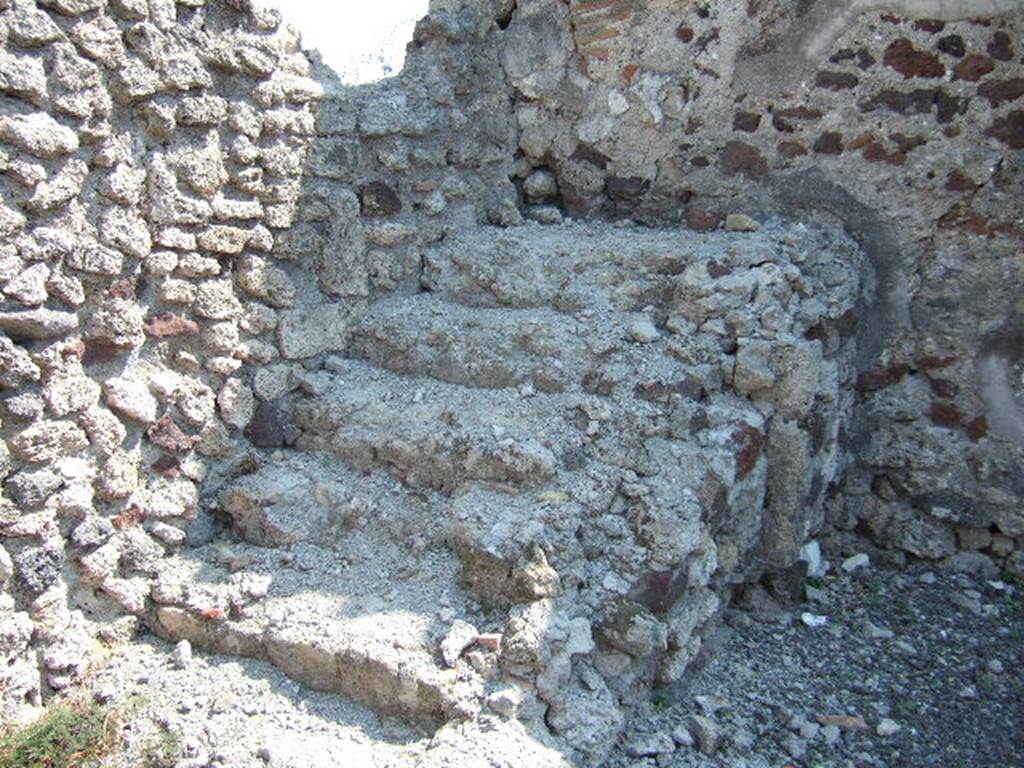 VI.2.29 Pompeii. September 2005. Looking south to steps to upper floor, immediately to south of entrance doorway.

