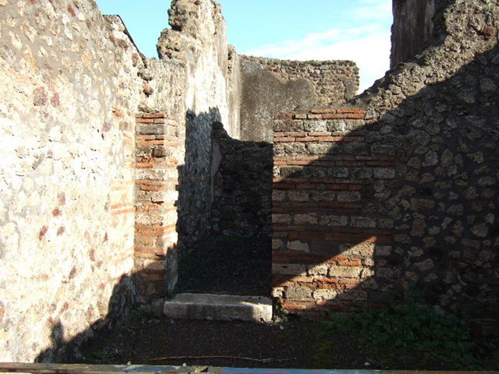 VI.3.1 Pompeii. December 2007. East wall with doorway to rear room