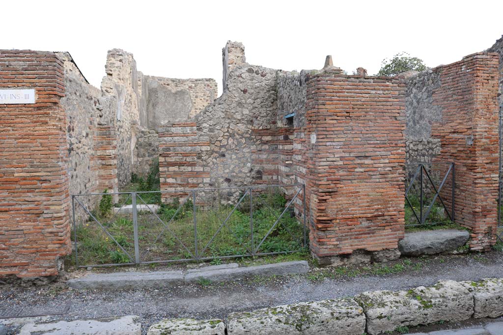 VI.3.2 Pompeii, on right. December 2018. 
Looking east to entrances on Via Consolare, with VI.3.1, on left. Photo courtesy of Aude Durand.
