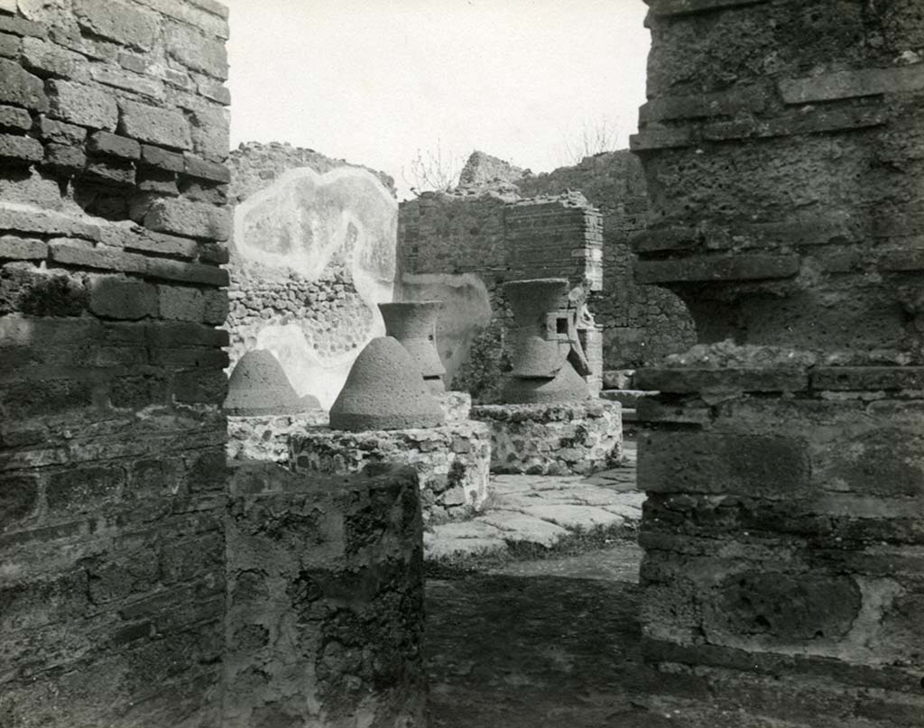 VI.3.3 Pompeii. 1913. Room 7, doorway from room 5, looking east across mills, towards rear entrance at VI.3.27.
Photo by Esther Boise Van Deman (c) American Academy in Rome. VD_Archive_Ph_211.
