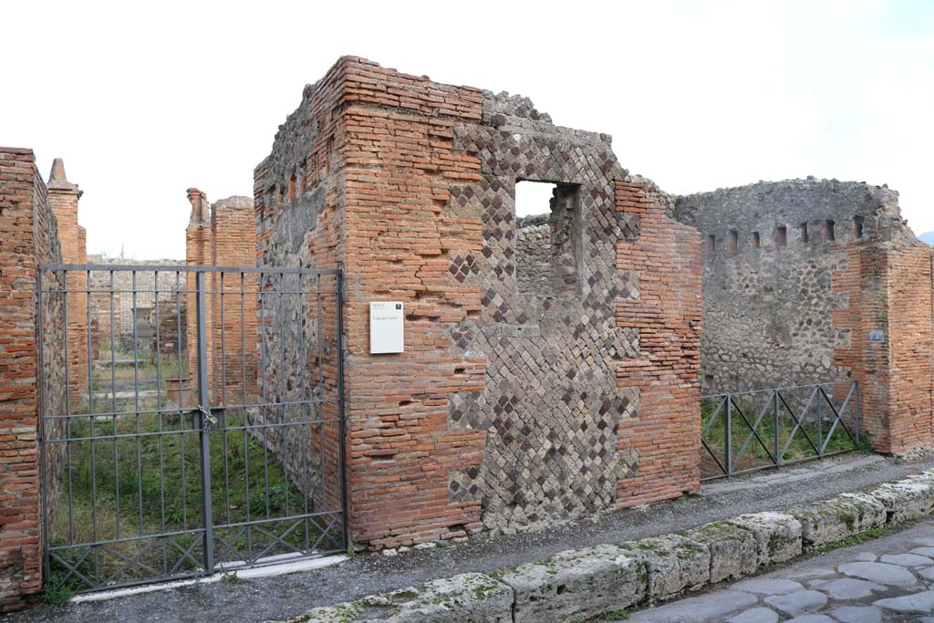 VI.3.4, Pompeii, on right. December 2018. 
Looking east to entrances on Via Consolare, with VI.3.3, on left. Photo courtesy of Aude Durand.
