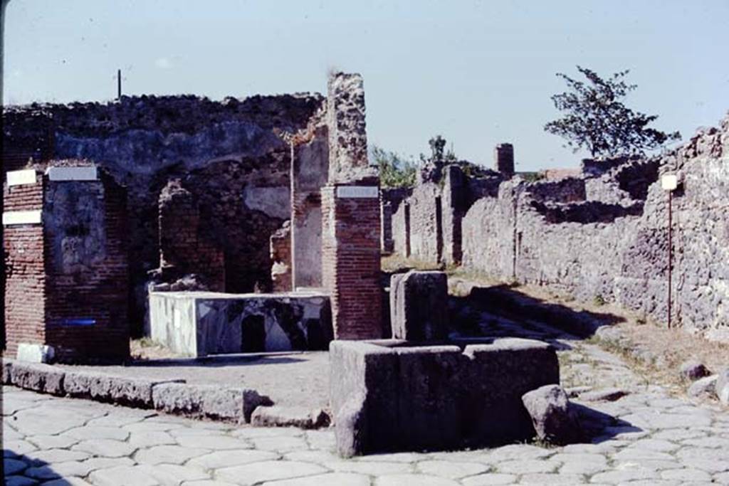VI.3.20 Pompeii. 1968. Looking north towards bar in Via Consolare and fountain at junction with Vicolo di Modesto. Photo by Stanley A. Jashemski.
Source: The Wilhelmina and Stanley A. Jashemski archive in the University of Maryland Library, Special Collections (See collection page) and made available under the Creative Commons Attribution-Non Commercial License v.4. See Licence and use details.
J68f1644
