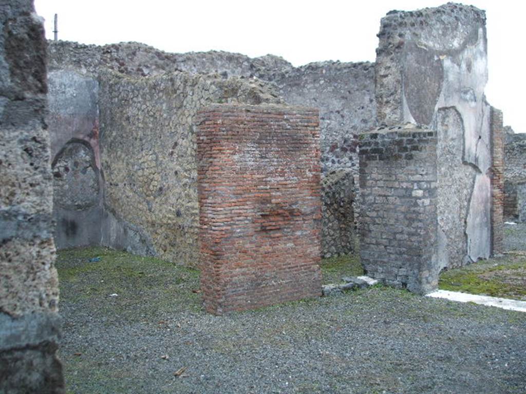 VI.3.25 Pompeii. December 2004. Looking south-west from rear entrance across garden towards triclinium, on left. According to Fiorelli, this had two paintings, one of the prophecy of Cassandra, the other probably Dido abandoned. The doorway in the centre, would have led into the storeroom with kitchen and stairs. See Pappalardo, U., 2001. La Descrizione di Pompei per Giuseppe Fiorelli (1875). Napoli: Massa Editore. (p.52). The other photos of this house can be seen from the front entrance at VI.3.7.
