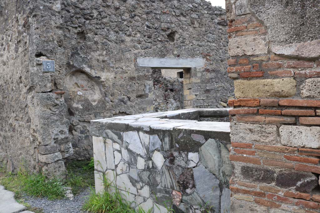 VI.4.3 Pompeii. December 2018. 
Looking towards south wall with doorway linking to VI.4.4, from entrance doorway on Via Consolare. Photo courtesy of Aude Durand.
