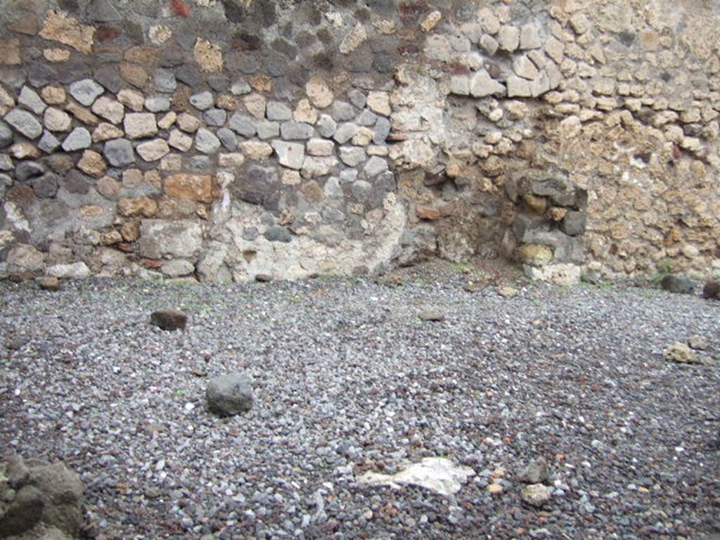 VI.4.9 Pompeii. December 2005. Looking north across remains of rooms on west side. 