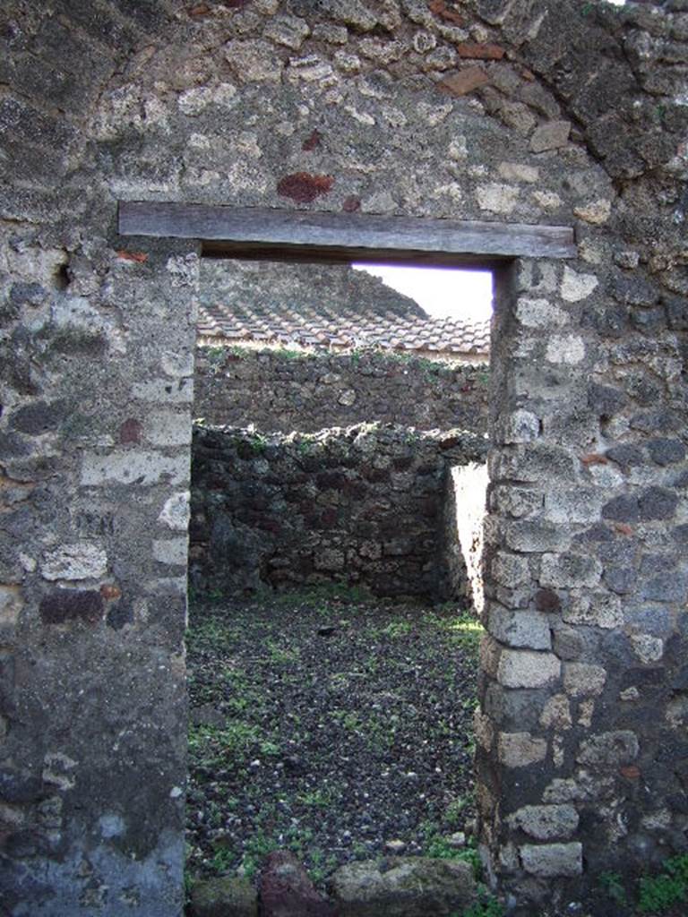 VI.5.14 Pompeii. December 2005. Doorway to room on south side of kitchen.