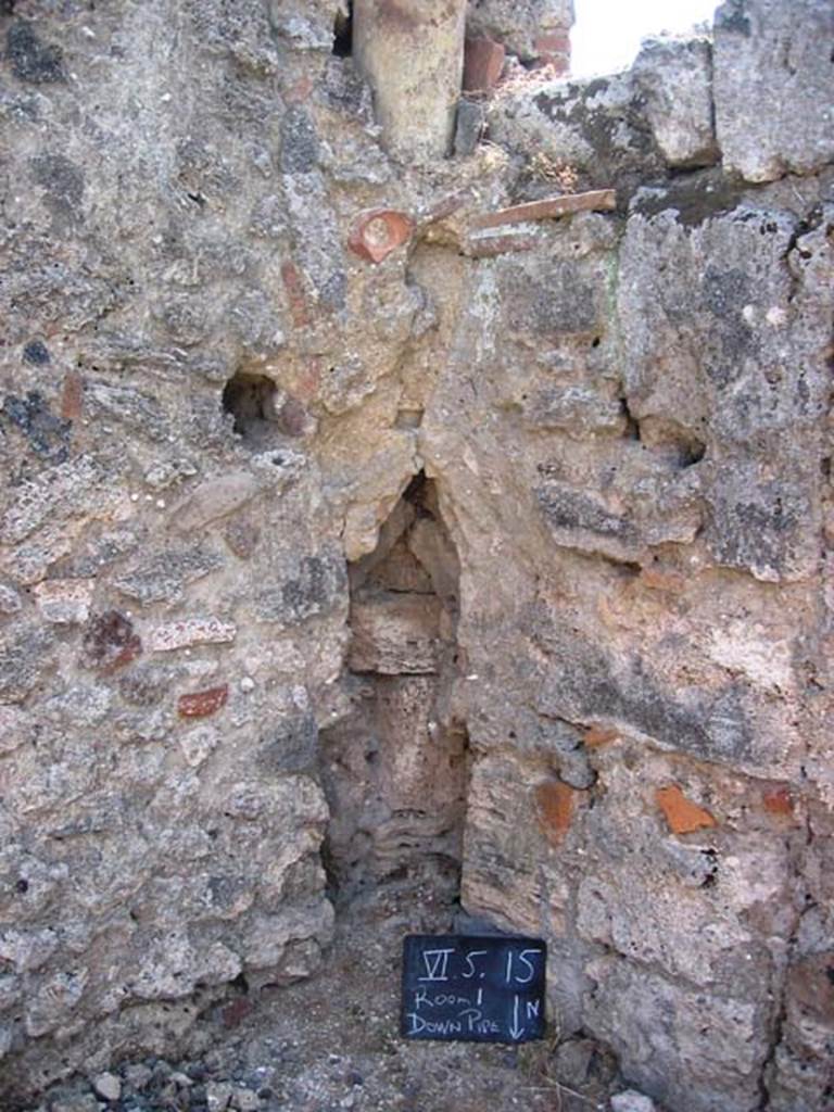 VI.5.15 Pompeii. July 2008. Downpipe in south-east corner of shop-room. Photo courtesy of Barry Hobson.