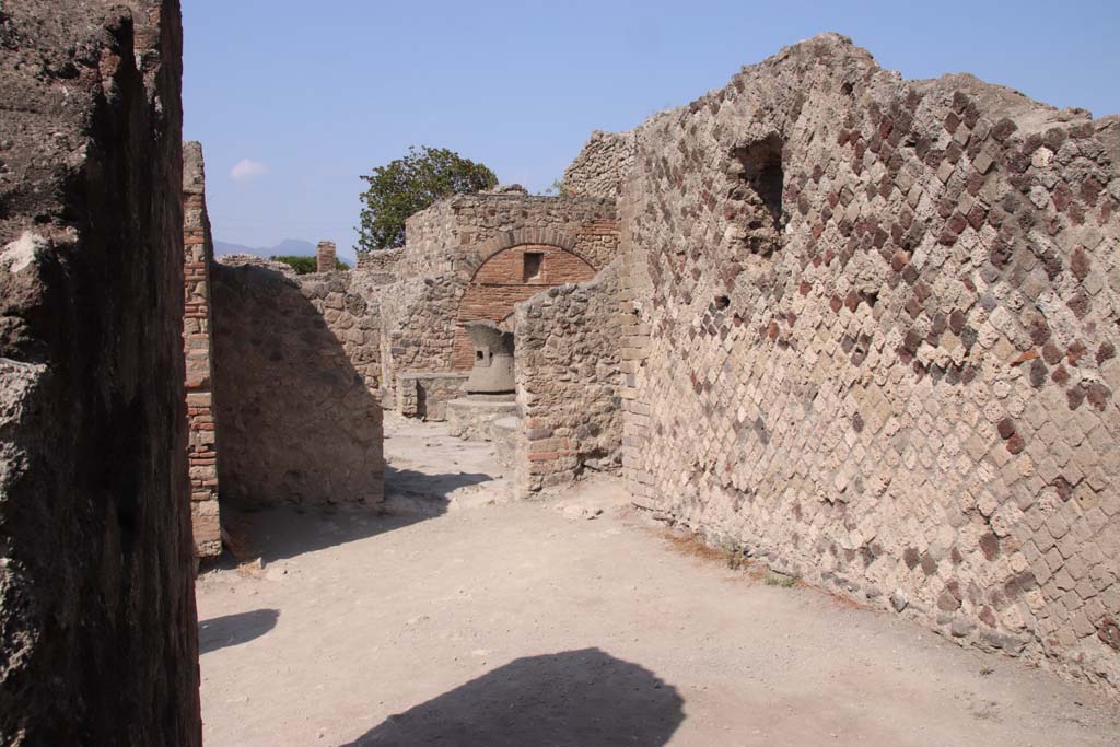 VI.6.17 Pompeii. September 2019. Looking towards doorway to bakery in north wall of entrance room. 
Photo courtesy of Klaus Heese.
