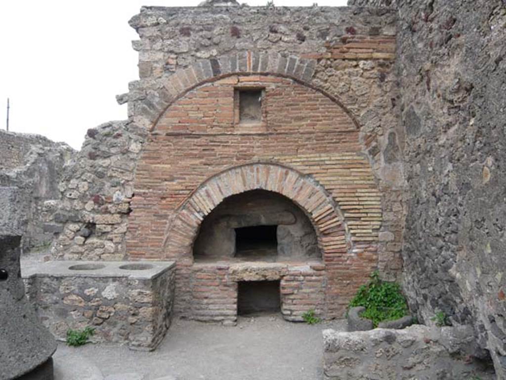 VI.6.17 Pompeii. May 2012. Looking north at front of oven. Photo courtesy of Buzz Ferebee.