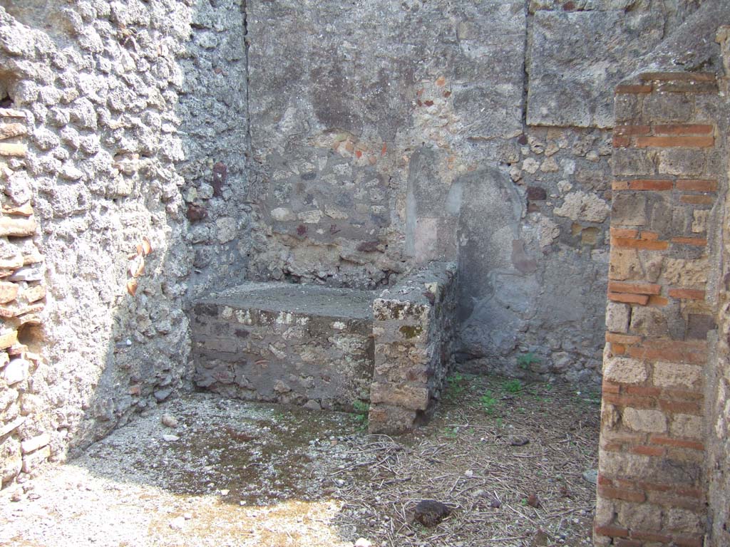 VI.7.3 Pompeii. March 2009. Room 7, kitchen, bench or hearth.