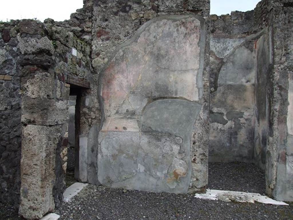 VI.7.20 Pompeii. December 2006. Doorways to rooms in south-east corner of atrium, and on south side.