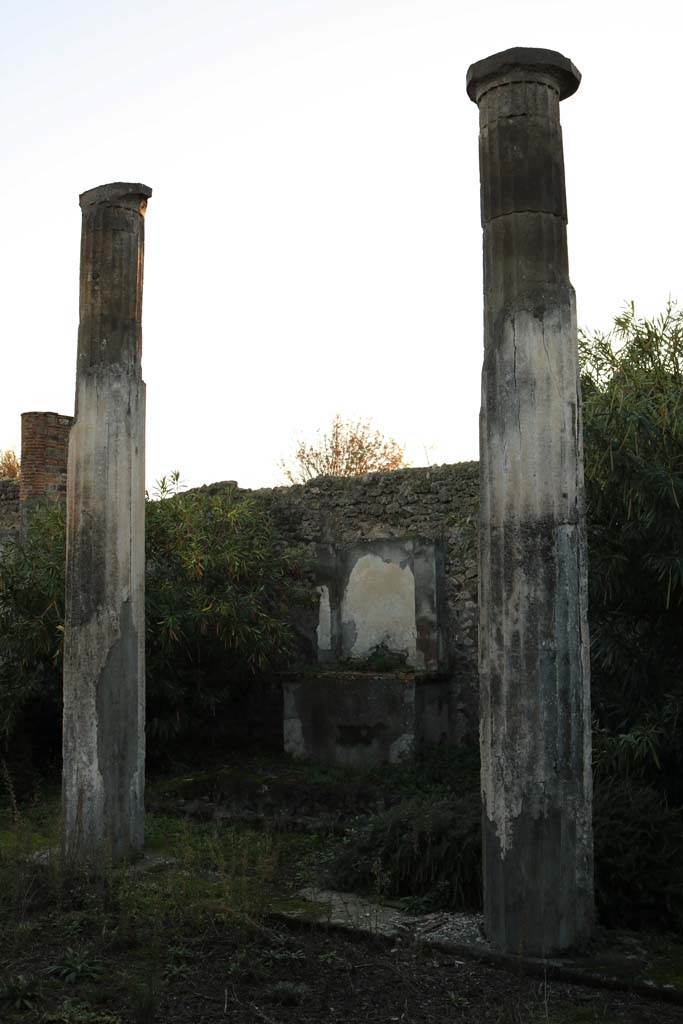 VI.7.20 Pompeii. December 2018. 
Looking south-west from east portico towards shrine against west wall. Photo courtesy of Aude Durand.

