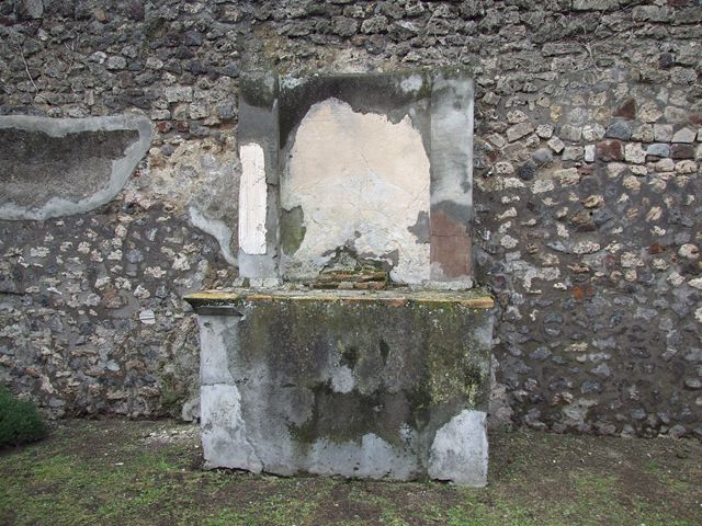 VI.7.20 Pompeii. December 2006. Shrine on rear wall of peristyle.
According to Boyce, this huge aedicula shrine stands against the west wall of the pseudoperistyle. See Boyce G. K., 1937. Corpus of the Lararia of Pompeii. Rome: MAAR 14. ( p48, no.166).
