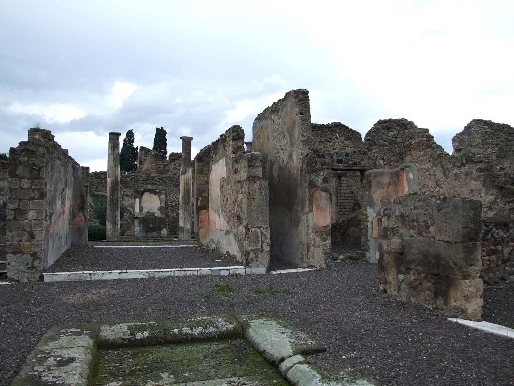 VI.7.20 Pompeii. December 2006. Looking west across atrium towards tablinum and corridor to rear.