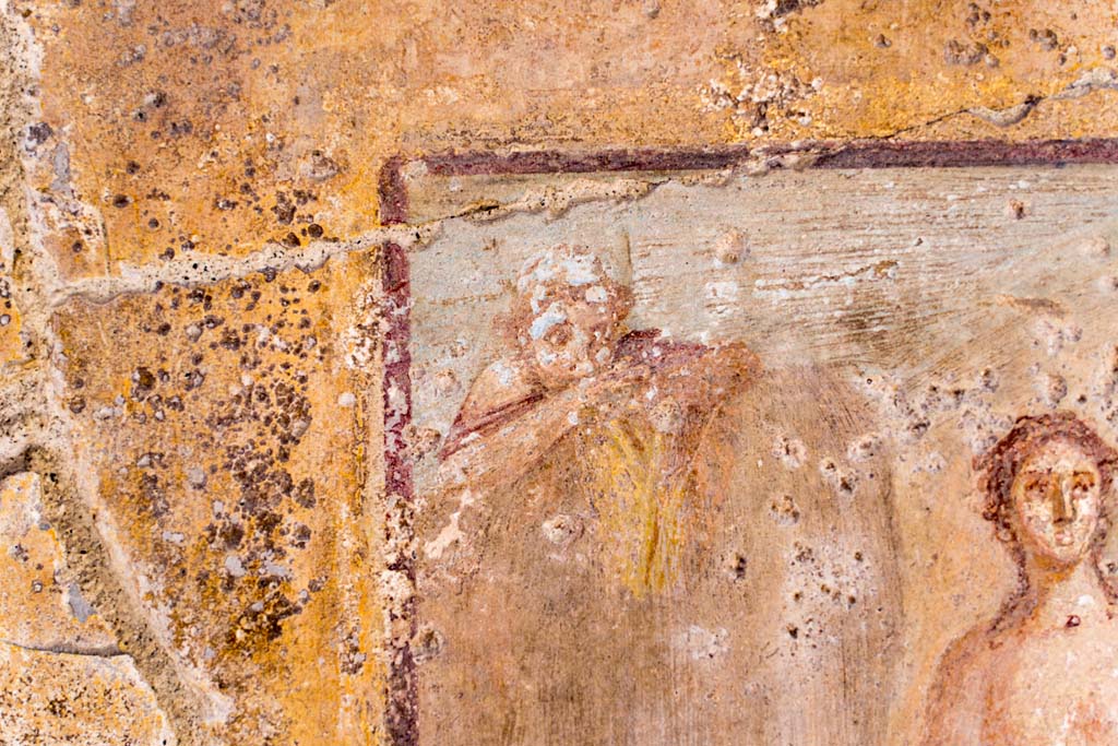 VI.7.23 Pompeii. July 2021. Detail from central painting on south wall of tablinum. Photo courtesy of Johannes Eber.