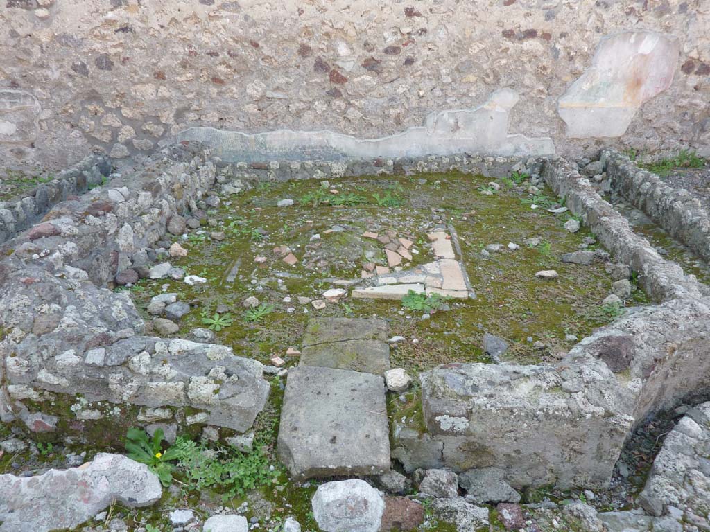 VI.7.23 Pompeii. July 2021. 
Looking east across remains of pyramidal fountain in courtyard, towards tablinum, atrium and entrance doorway.
Photo courtesy of Johannes Eber.

