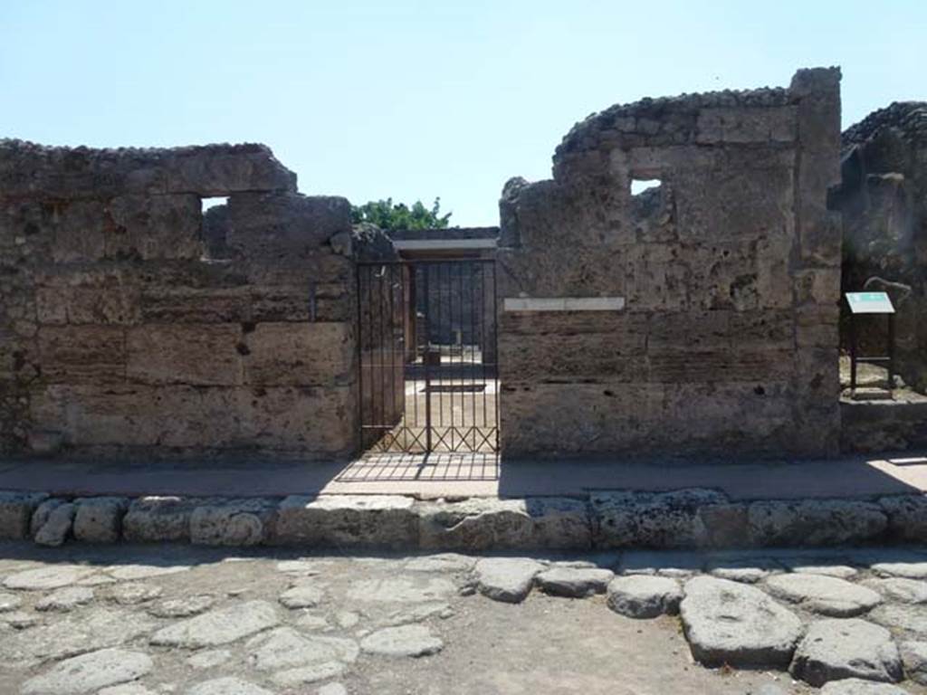 VI.7.23 Pompeii. June 2012. Looking west to entrance doorway on Via Mercurio. Photo courtesy of Michael Binns.
