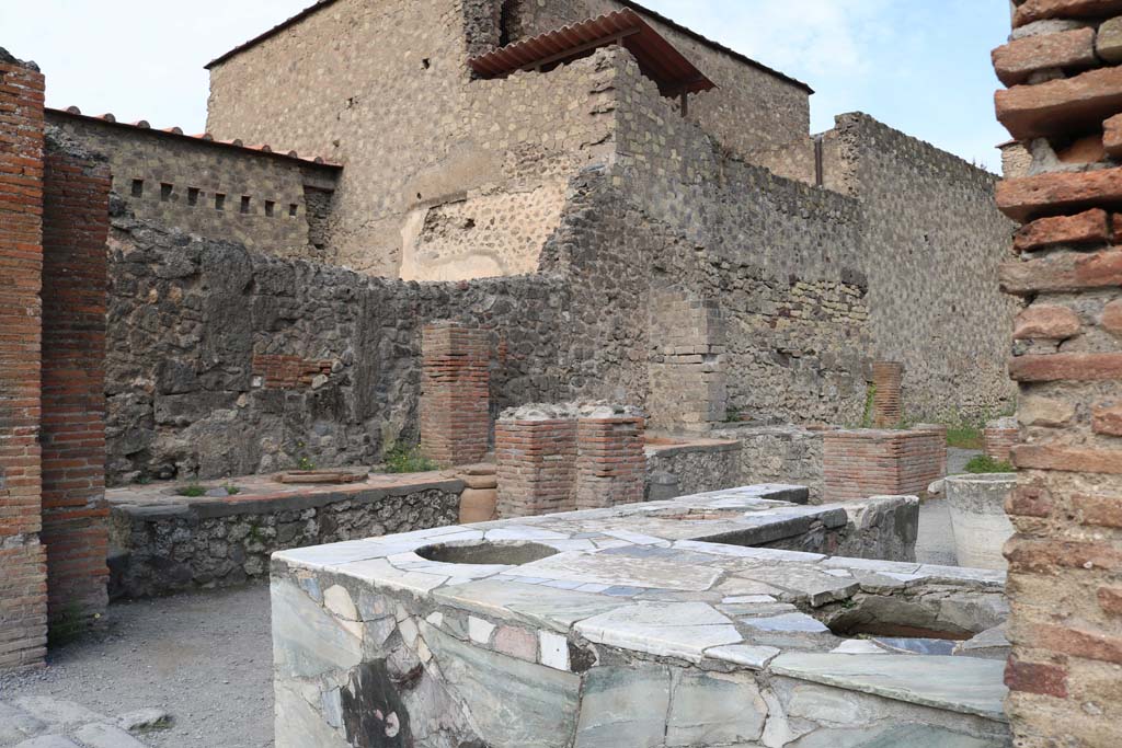 VI.8.8 Pompeii. December 2018. Looking north-west across counter towards west side of bar-room. Photo courtesy of Aude Durand.