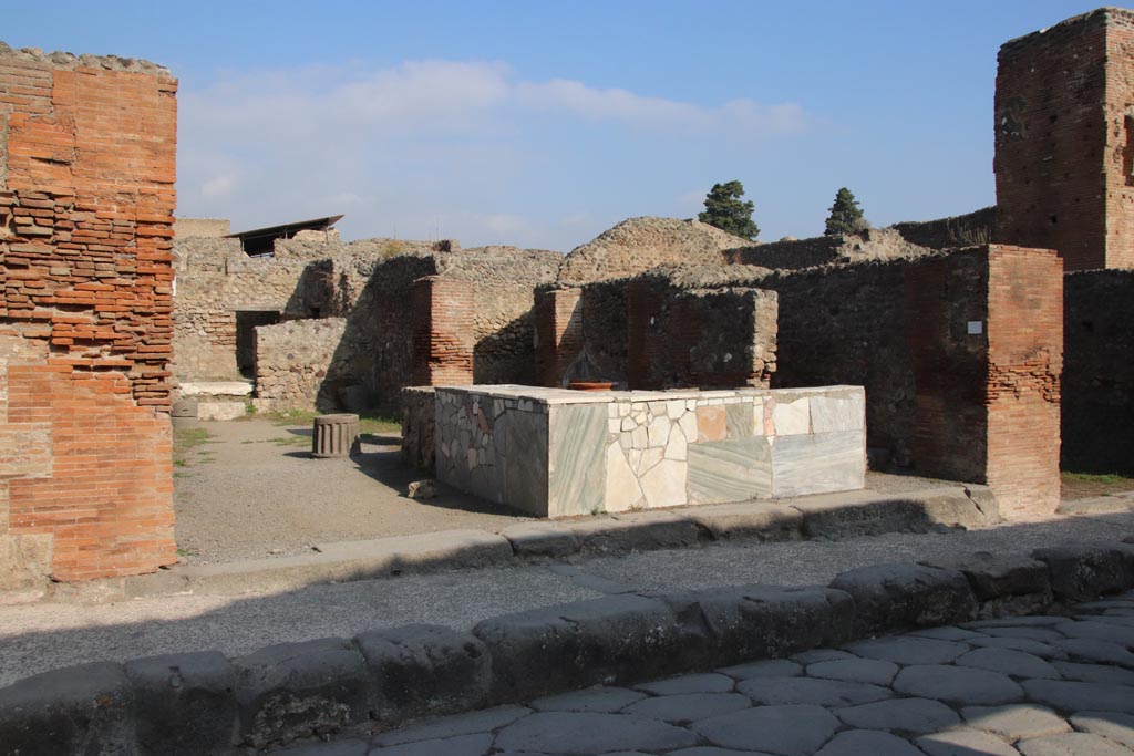 VI.8.9 Pompeii, on left. December 2018. 
Looking north on Via delle Terme. VI.8.10, steps to upper floor, is on the right. Photo courtesy of Aude Durand. 
